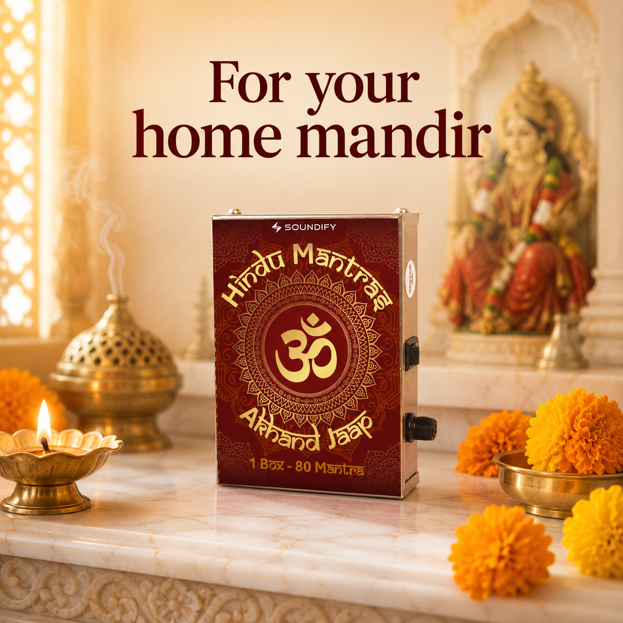 Hindu 80-in-1 mantra chanting box in a home mandir with diya and marigolds