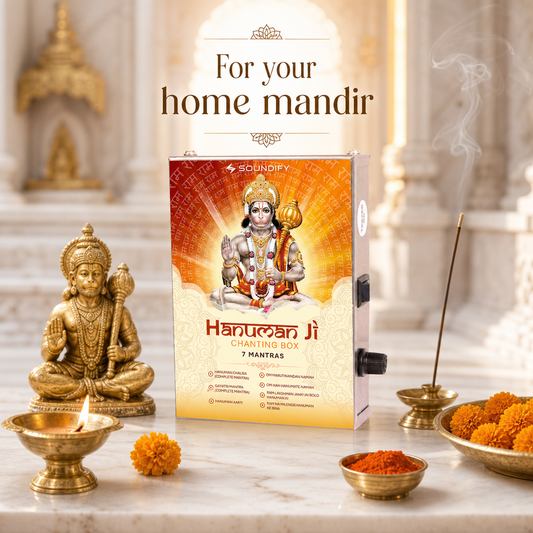 Hanuman Ji mantra player in a home mandir with diya and marigolds